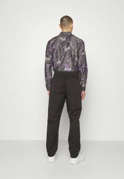 Han Kjøbenhavn TROUSERS - Trousers - Black -Han Kjøbenhavn Shop 01f4c4e35fc24c5893bc8ed84d5e0704