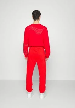 Han Kjøbenhavn PANTS - Tracksuit Bottoms - Red -Han Kjøbenhavn Shop 0a22bbd156db4392a453196fd3ecb177