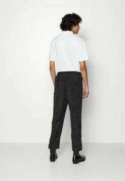 Han Kjøbenhavn TRACK PANTS - Trousers - Black -Han Kjøbenhavn Shop 18c12597f37b4dd999e317e25e5cccd7