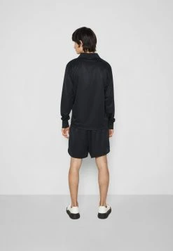 Han Kjøbenhavn FOOTBALL LONG SLEEVE - Shirt - Black -Han Kjøbenhavn Shop 18e0f9a2408a43c091bdafb9c132f58b