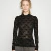 Han Kjøbenhavn MONOGRAM TURTLENECK - Long Sleeved Top - Black -Han Kjøbenhavn Shop 1df11534763d411aa4e09b5b56068c1f
