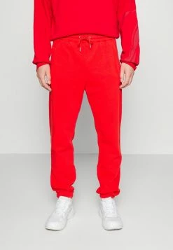 Han Kjøbenhavn PANTS - Tracksuit Bottoms - Red