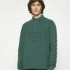 Han Kjøbenhavn SHIRT LONG SLEEVE - Polo Shirt - Dusty Green -Han Kjøbenhavn Shop c24a9f6541dd405ab729f7e1436407f6