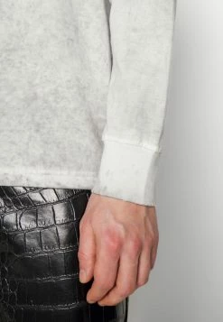 Han Kjøbenhavn BOXY LONG SLEEVE - Long Sleeved Top - Black Bleached -Han Kjøbenhavn Shop c5e12ada99dc44ae838a2185b9cb8a70